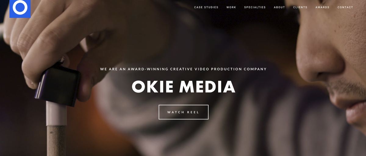 Okie Media website homepage with full-bleed video hero